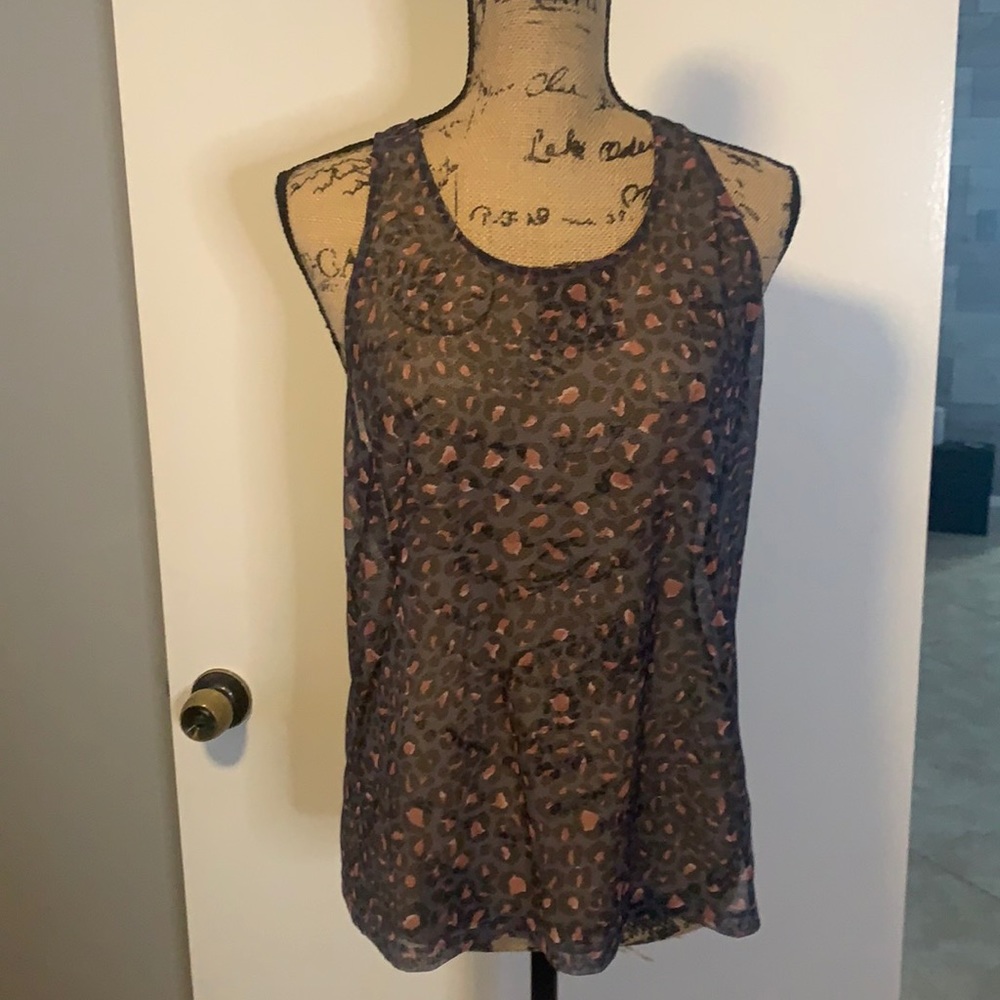 2 tank tops. victory secret. One w new tags